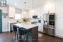 135 Ritchie Crescent, Springwater, ON  - Indoor Photo Showing Kitchen With Upgraded Kitchen 