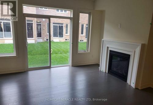 12 Gosset Road, Brampton, ON - Indoor Photo Showing Living Room With Fireplace