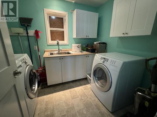 3115 Oceanview Drive, Daajing Giids City, BC - Indoor Photo Showing Laundry Room