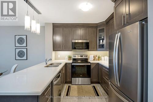 119 - 830 Megson Terrace, Milton, ON - Indoor Photo Showing Kitchen With Double Sink With Upgraded Kitchen