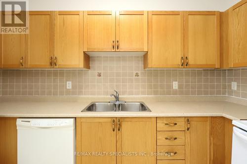 101 - 98 William Street, Mississauga, ON - Indoor Photo Showing Kitchen With Double Sink