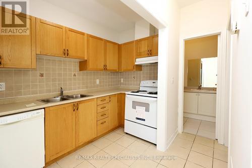 101 - 98 William Street, Mississauga, ON - Indoor Photo Showing Kitchen With Double Sink