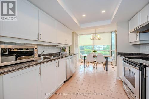 406 - 55 Kingsbridge Garden Circle, Mississauga, ON - Indoor Photo Showing Kitchen With Double Sink