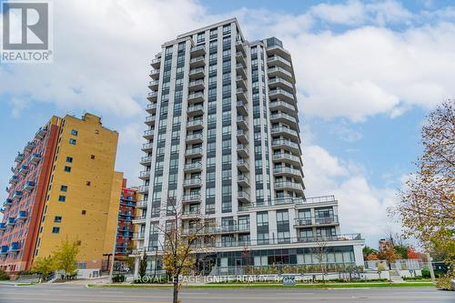 806 - 840 Queens Plate Drive, Toronto, ON - Outdoor With Balcony With Facade