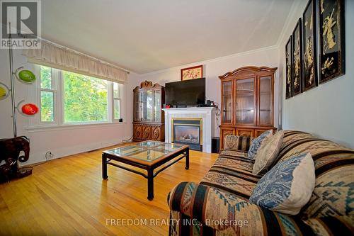 86 Neywash Street, Orillia, ON - Indoor Photo Showing Living Room With Fireplace