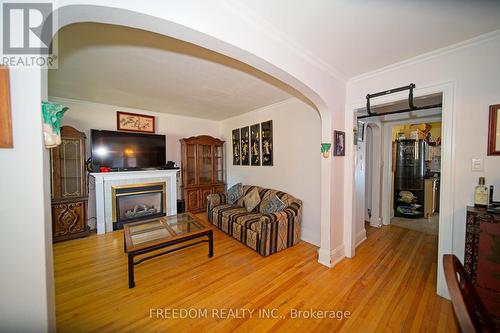 86 Neywash Street, Orillia, ON - Indoor Photo Showing Living Room With Fireplace