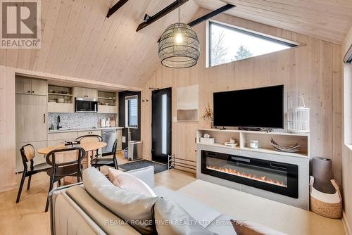 12 - 1026 Merrill Road, Alnwick/Haldimand, ON - Indoor Photo Showing Living Room With Fireplace