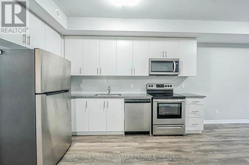 713 - 2635 William Jackson Drive, Pickering, ON - Indoor Photo Showing Kitchen With Stainless Steel Kitchen