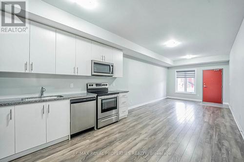 713 - 2635 William Jackson Drive, Pickering, ON - Indoor Photo Showing Kitchen With Stainless Steel Kitchen