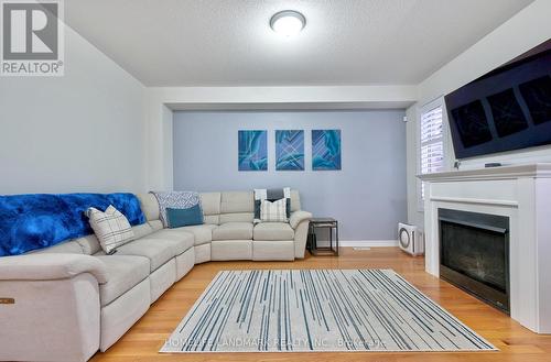 84 Workmen'S Circle, Ajax, ON - Indoor Photo Showing Living Room With Fireplace