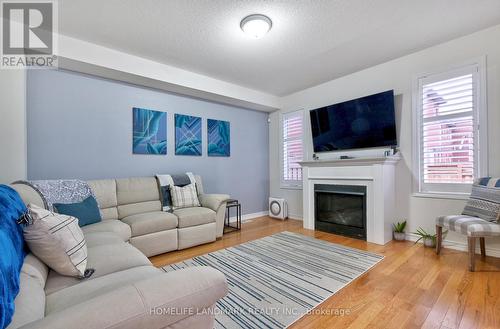 84 Workmen'S Circle, Ajax, ON - Indoor Photo Showing Living Room With Fireplace