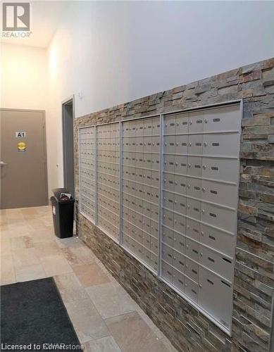 Corridor featuring mail boxes - 308 Lester Street Unit# 215, Waterloo, ON - Indoor Photo Showing Other Room