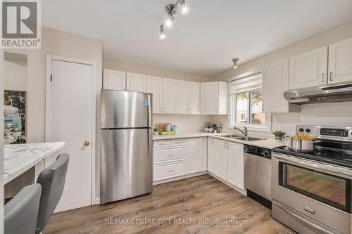 20 - 215 Commissioners Road W, London, ON - Indoor Photo Showing Kitchen With Double Sink