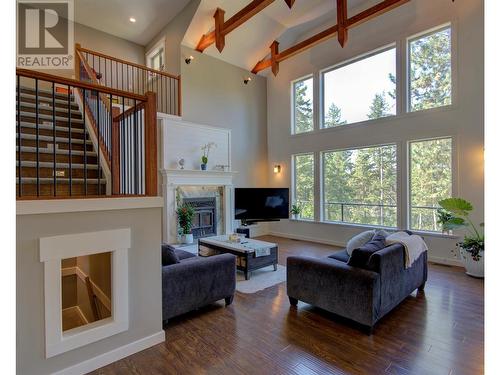 4322 Sharp Road, Armstrong, BC - Indoor Photo Showing Living Room With Fireplace