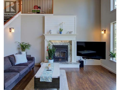 4322 Sharp Road, Armstrong, BC - Indoor Photo Showing Living Room With Fireplace