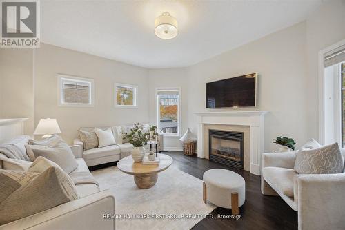 10 Duckfield Crescent, Ajax (South East), ON - Indoor Photo Showing Living Room With Fireplace