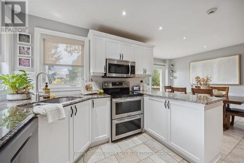 122 Robert Adams Drive, Clarington (Courtice), ON - Indoor Photo Showing Kitchen With Double Sink