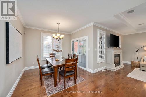 3700 Settlement Trail, London, ON - Indoor Photo Showing Dining Room With Fireplace