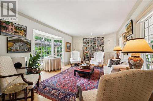 Comfy living room with bay window - the owners use the table for casual meals - 4254 O'Neil Road, Stittsville - Munster - Richmond (8210 - Rideau Twp South To Roger Stevens Drive), ON - Indoor Photo Showing Living Room