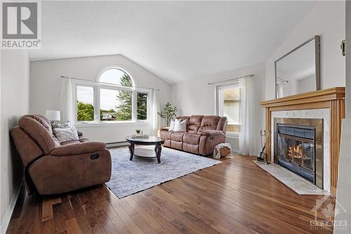 16 Burlington Crescent, Ottawa, ON - Indoor Photo Showing Living Room With Fireplace