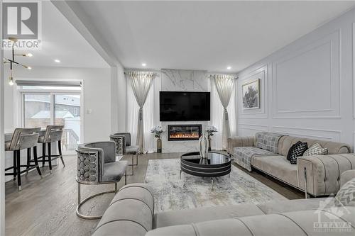 1002 Offley Road, Ottawa, ON - Indoor Photo Showing Living Room With Fireplace