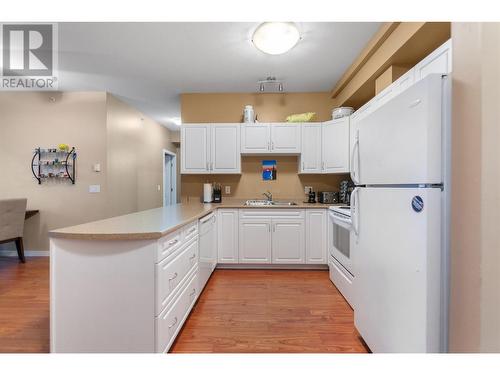 778 Rutland Road Unit# 406, Kelowna, BC - Indoor Photo Showing Kitchen With Double Sink