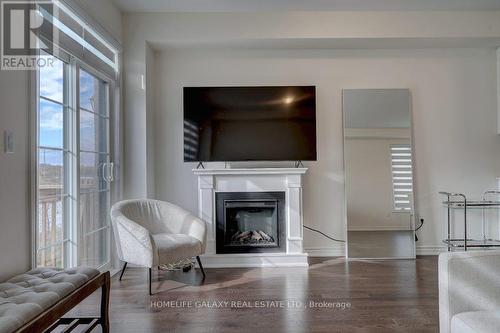 28 Velvet Drive, Whitby, ON - Indoor Photo Showing Living Room With Fireplace