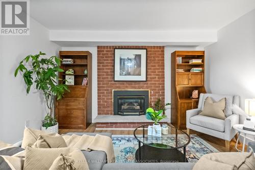 266 Coxe Boulevard, Milton, ON - Indoor Photo Showing Living Room With Fireplace