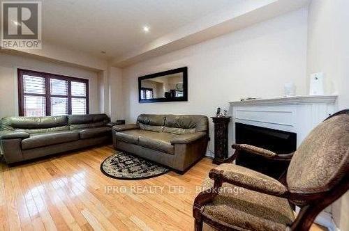 91 Breton Avenue, Mississauga, ON - Indoor Photo Showing Living Room With Fireplace