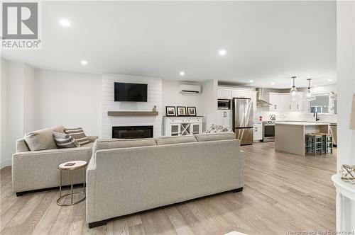 121 Oakfield, Riverview, NB - Indoor Photo Showing Living Room With Fireplace