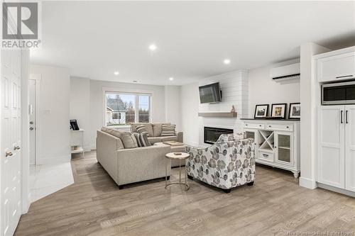 121 Oakfield, Riverview, NB - Indoor Photo Showing Living Room With Fireplace