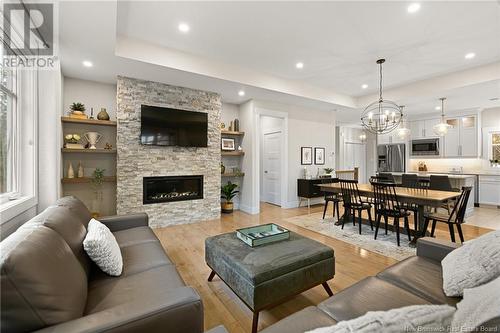 31 Pheasant Street, Grand-Barachois, NB - Indoor Photo Showing Living Room With Fireplace