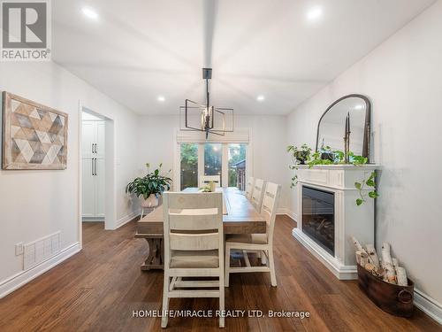 521 Oneida Drive, Burlington, ON - Indoor Photo Showing Dining Room With Fireplace