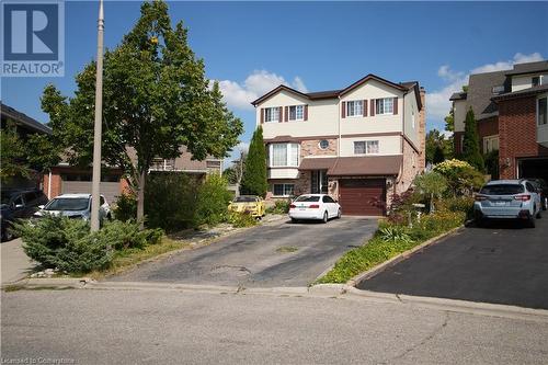 View of front of house featuring a garage - 30 Kristi Place, Kitchener, ON - Outdoor With Facade