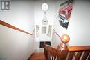 Stairs featuring wood-type flooring and a chandelier - 30 Kristi Place, Kitchener, ON  - Indoor Photo Showing Other Room 