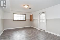 Spare room featuring hardwood / wood-style flooring - 