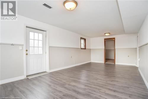 Unfurnished room with hardwood / wood-style floors - 30 Kristi Place, Kitchener, ON - Indoor Photo Showing Other Room