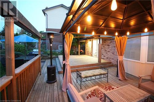 Deck at dusk featuring a gazebo - 30 Kristi Place, Kitchener, ON - Outdoor With Deck Patio Veranda With Exterior