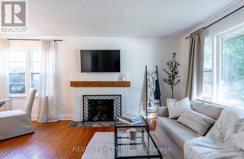 31 Academy Street, Hamilton, ON - Indoor Photo Showing Living Room With Fireplace