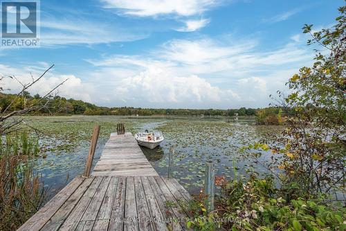 1911 Ormsbee Road, South Frontenac, ON - Outdoor With Body Of Water With Deck Patio Veranda With View