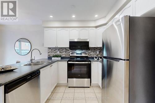 1534 Evans Terrace, Milton, ON - Indoor Photo Showing Kitchen With Double Sink