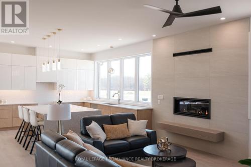 158 Summerside Drive, South Frontenac, ON - Indoor Photo Showing Living Room With Fireplace