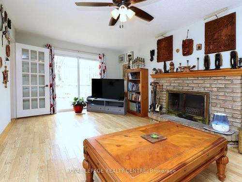 2576 Evelyn Crt, Mississauga, ON - Indoor Photo Showing Living Room With Fireplace