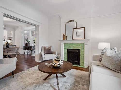 23 Geoffrey St, Toronto, ON - Indoor Photo Showing Living Room With Fireplace