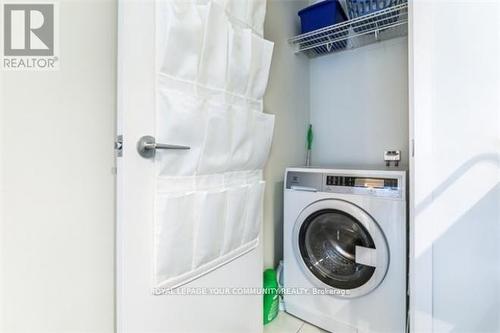 902 - 10 Capreol Court, Toronto, ON - Indoor Photo Showing Laundry Room