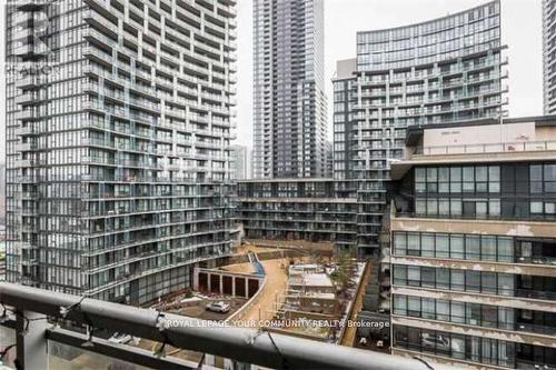 902 - 10 Capreol Court, Toronto, ON - Outdoor With Balcony With Facade