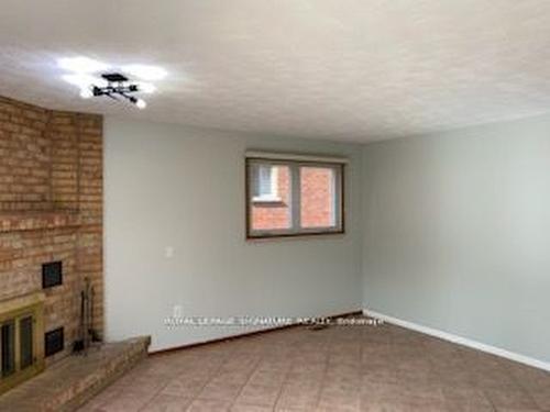 Bsmt-709 Upper Paradise Rd, Hamilton, ON - Indoor Photo Showing Other Room With Fireplace