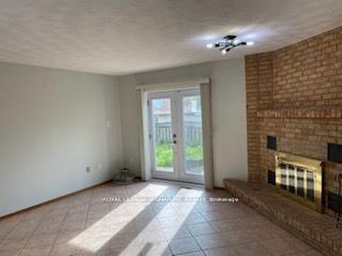 Bsmt-709 Upper Paradise Rd, Hamilton, ON - Indoor Photo Showing Other Room With Fireplace