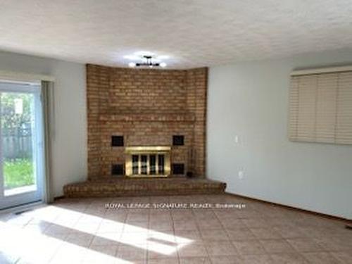 Bsmt-709 Upper Paradise Rd, Hamilton, ON - Indoor With Fireplace