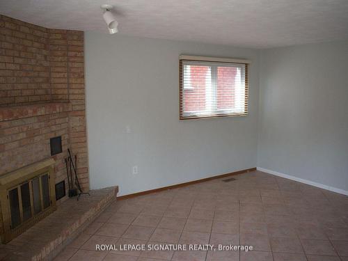 Bsmt-709 Upper Paradise Rd, Hamilton, ON - Indoor Photo Showing Other Room With Fireplace